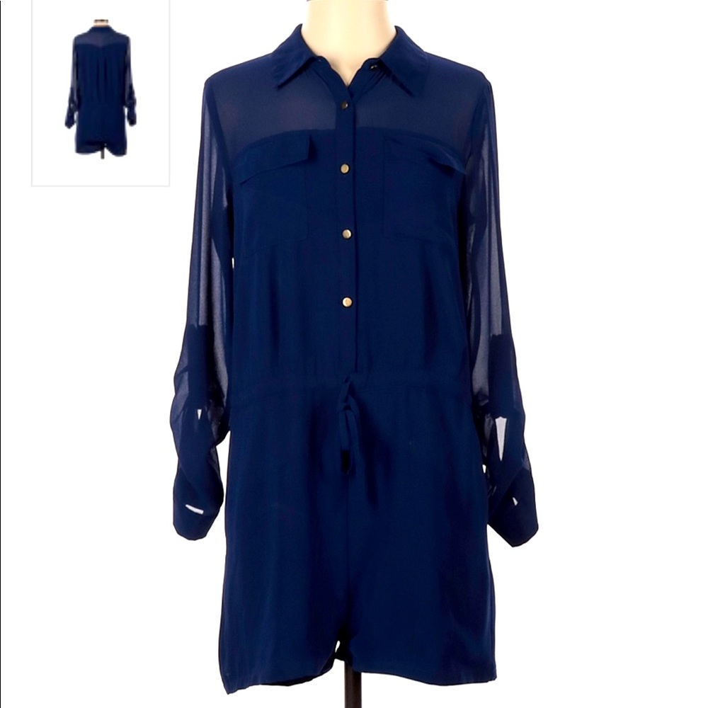 White Zebra. Long sleeve navy romper. Size small.